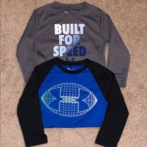 2 boys UA shirts